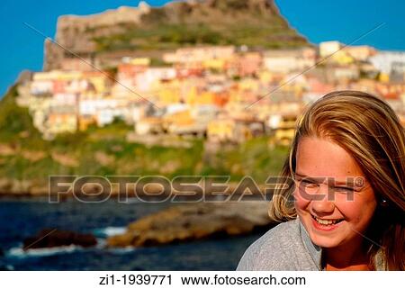 laughing girl with houses of Bosa, Sardinia at background View Large Photo Image Stock Image - laughing girl with houses of Bosa, Sardinia at background. Fotosearch