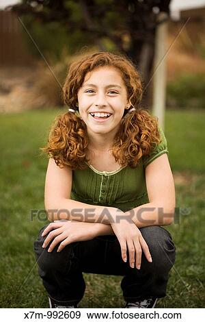 Laughing young mixed race mexican & caucasian girl View Large Photo Image Stock Photo - Laughing young mixed race mexican & caucasian girl. Fotosearch