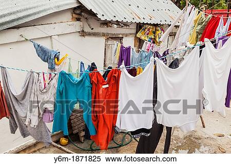 Laundry hanging out to dry, Isla Mujeres, Yucatan Peninsula, Quintana Roo, Mexico View Large Photo Image Stock Photography - Laundry hanging out to dry, Isla Mujeres, Yucatan Peninsula, Quintana Roo, Mexico. Fotosearch