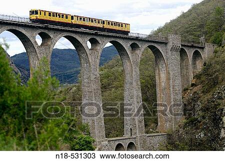 ? Le Train Jaune?. Fontp? drouse. Villefranche-de-Conflent, Languedoc-Roussillon, France. View Large Photo Image Stock Image - ? Le Train Jaune?. Fontp? drouse. Villefranche-de-Conflent, Languedoc-Roussillon, France.. Fotosearch