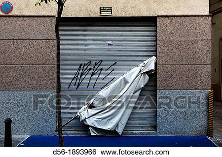 leaning umbrella View Large Photo Image Stock Photograph - leaning umbrella. Fotosearch