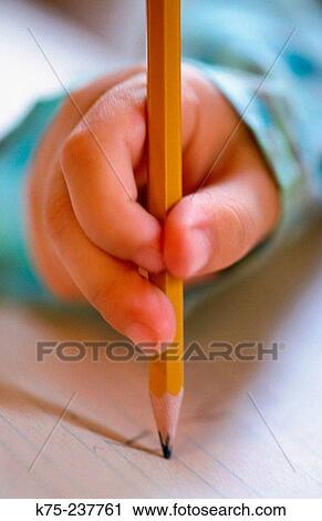 Stock Image - Learning to write. Fotosearch