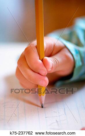 Stock Image - Learning to write. Fotosearch