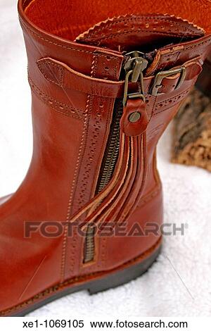 Leather mid-cut boot. View Large Photo Image Stock Photography - Leather mid-cut boot.. Fotosearch