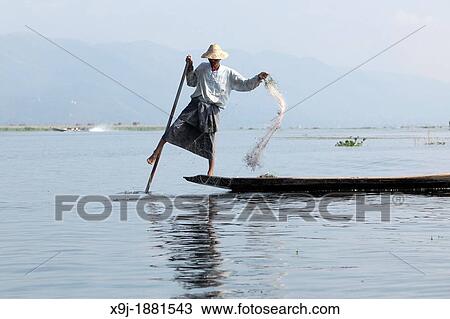 Leg-rower at fisherman, Inle Lake, Shan state, Myanmar, Burma View Large Photo Image Stock Image - Leg-rower at fisherman, Inle Lake, Shan state, Myanmar, Burma. Fotosearch