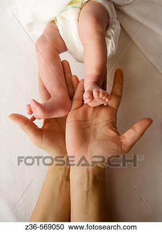 Legs of one week old girl View Large Photo Image Stock Image - Legs of one week old girl. Fotosearch