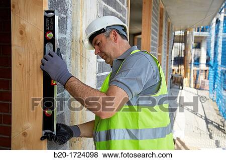 Stock Photo - Level, Hand Tools for construction, Worker, Housing construction, Basque Country, Spain. Fotosearch