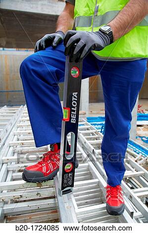 Stock Photography - Level, Hand Tools for construction, Worker, Housing construction, Basque Country, Spain. Fotosearch