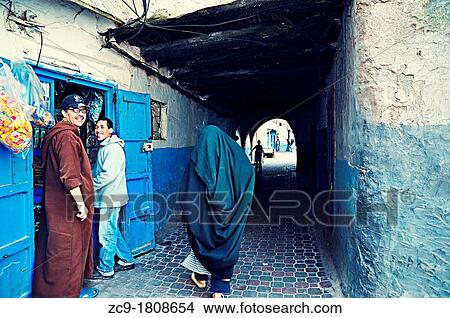 Life in the narrow alleyways of the medina Essaouira, Morocco View Large Photo Image Picture - Life in the narrow alleyways of the medina Essaouira, Morocco. Fotosearch