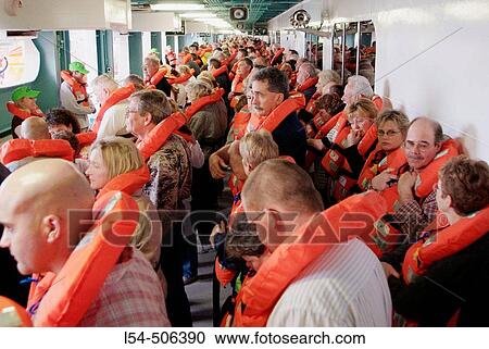 Life jacket vest drill aboard the Cruis Ship Carnival Fantasy traveling to the Islands of Nassau, St. Maarten, Martin, and St. Thomas Virgin Islands from Port Canaveral, Florida View Large Photo Image Stock Image - Life jacket vest drill aboard the Cruis Ship Carnival Fantasy traveling to the Islands of Nassau, St. Maarten, Martin, and St. Thomas Virgin Islands from Port Canaveral, Florida. Fotosearch