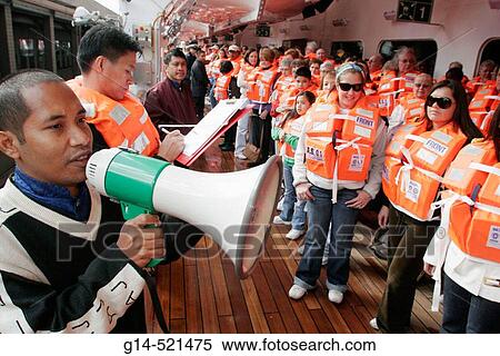 Lifeboat drill, passengers, lifejacket, Asian male crew. Holland America Line, MS Noordam. Manhattan. New York. USA. View Large Photo Image Stock Photography - Lifeboat drill, passengers, lifejacket, Asian male crew. Holland America Line, MS Noordam. Manhattan. New York. USA.. Fotosearch