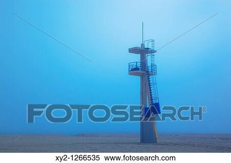 Lifeguard tower on Playamar beach in off-season on foggy day Torremolinos, Malaga Province, Costa del Sol, Spain View Large Photo Image Stock Photography - Lifeguard tower on Playamar beach in off-season on foggy day Torremolinos, Malaga Province, Costa del Sol, Spain. Fotosearch