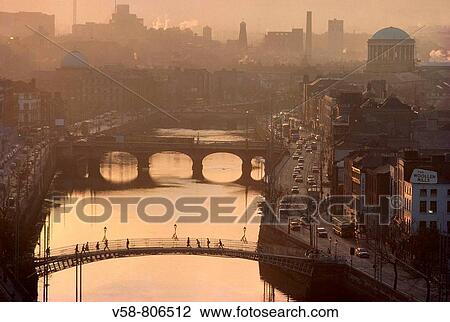 LIFFEY RIVER AND HALF PENNY BIRDGE, DUBLIN, IRELAND View Large Photo Image Stock Image - LIFFEY RIVER AND HALF PENNY BIRDGE, DUBLIN, IRELAND. Fotosearch
