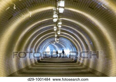 light at the end of a tunnel - family of three walking View Large Photo Image Picture - light at the end of a tunnel - family of three walking. Fotosearch