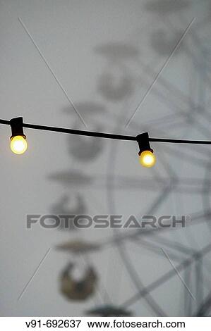 Light bulbs in fog, Tibidabo amusement park, Barcelona. Catalonia, Spain (August 2005) View Large Photo Image Stock Photo - Light bulbs in fog, Tibidabo amusement park, Barcelona. Catalonia, Spain (August 2005). Fotosearch