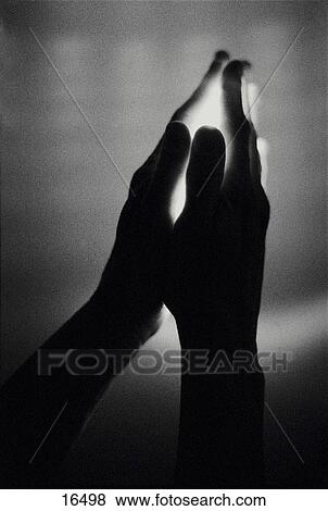 Light coming from hands View Large Photo Image Stock Photo - Light coming from hands. Fotosearch