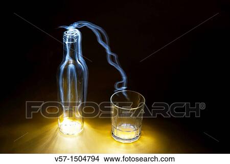 Picture - Light-painting with a bottle and a glass. Fotosearch
