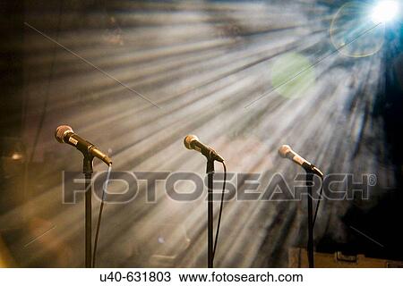 Light streaming on microphones View Large Photo Image Stock Image - Light streaming on microphones. Fotosearch