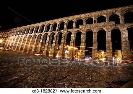 Stock Photo - Light trails and Roman Aqueduct. Segovia, Spain. Fotosearch