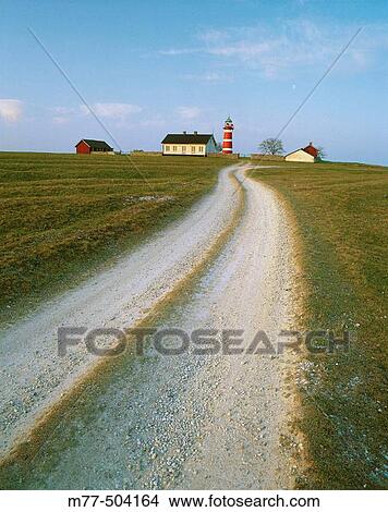 Lighthouse and gravel road, Gotland, Sweden. View Large Photo Image Picture - Lighthouse and gravel road, Gotland, Sweden.. Fotosearch