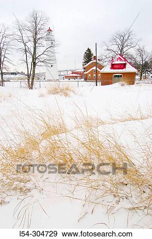 Stock Photo - Lighthouse and houses. Port Huron. Michigan. USA. Fotosearch