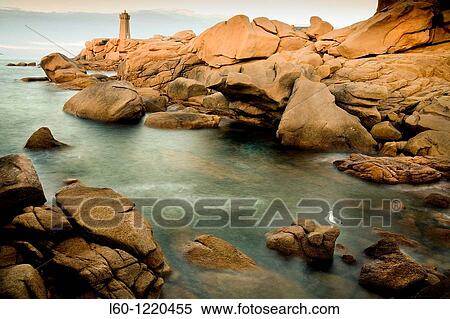 Stock Photography - Lighthouse at Cote de Granit Rose, France, Brittany, Granit Rose. Fotosearch
