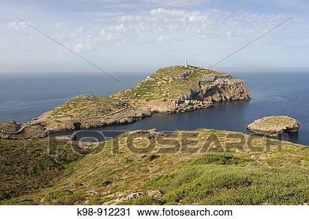 Lighthouse at Punta de n? Ensiola, Cabrera National Park, Balearic Islands, Spain View Large Photo Image Stock Image - Lighthouse at Punta de n? Ensiola, Cabrera National Park, Balearic Islands, Spain. Fotosearch