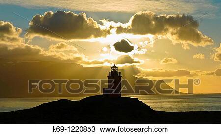 Lighthouse at Sunset Iceland View Large Photo Image Stock Image - Lighthouse at Sunset Iceland. Fotosearch