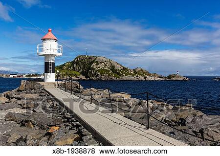 Lighthouse in the Norwegian cod fishing town of Reine, Lofoton Islands, Norway View Large Photo Image Stock Photo - Lighthouse in the Norwegian cod fishing town of Reine, Lofoton Islands, Norway. Fotosearch