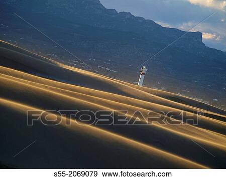 Lighthouse, Punta del Fangar. Natural Park of Delta del Ebro, Tarragona, Catalonia, Spain. View Large Photo Image Stock Photo - Lighthouse, Punta del Fangar. Natural Park of Delta del Ebro, Tarragona, Catalonia, Spain.. Fotosearch