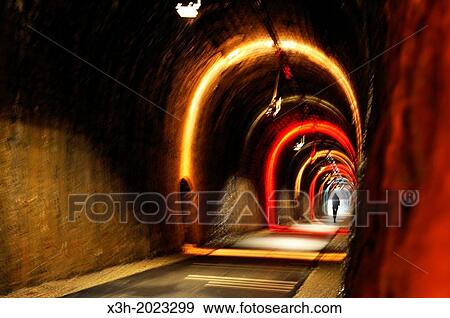 lighting in the tunnel of La Vernede by Atelier Lumiere, Promenade du Viaduc, greenway renovation of the old railway through the Le Vigan area, Cevennes, Gard department, Languedoc-Roussillon region, France, Europe. View Large Photo Image Stock Photo - lighting in the tunnel of La Vernede by Atelier Lumiere, Promenade du Viaduc, greenway renovation of the old railway through the Le Vigan area, Cevennes, Gard department, Languedoc-Roussillon region, France, Europe.. Fotosearch