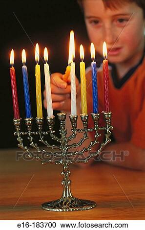 Lighting the menorah View Large Photo Image Stock Image - Lighting the menorah. Fotosearch