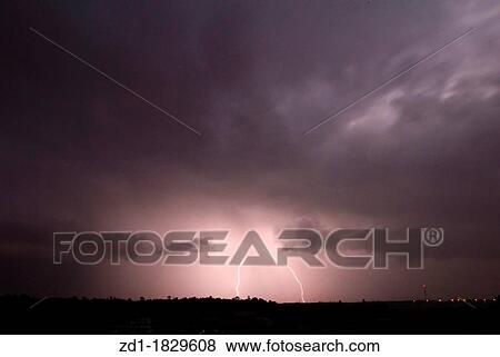 Stock Photo - lightning thunder storms cloudy skies heavy rainfall. Fotosearch