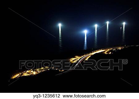 Lights of fishing boats off the coast of Cerdigo, Castro Urdiales, Cantabria, Spain. View Large Photo Image Stock Image - Lights of fishing boats off the coast of Cerdigo, Castro Urdiales, Cantabria, Spain.. Fotosearch