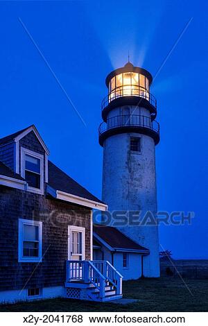 Ligthouse casts guiding light into dark blue night, Truro, Cape Cod, Massachusetts, USA. View Large Photo Image Stock Photo - Ligthouse casts guiding light into dark blue night, Truro, Cape Cod, Massachusetts, USA.. Fotosearch