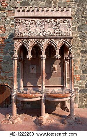 Stock Image - Lion fountain at the medieval castle - King Mathias Museum Hungary. Fotosearch