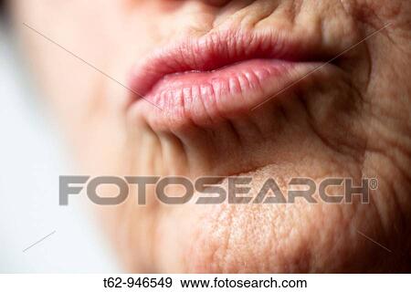 Lips of woman, wrinkled face Kiss Color View Large Photo Image Stock Photo - Lips of woman, wrinkled face Kiss Color. Fotosearch