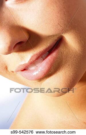 Lipstick close-up on lips View Large Photo Image Stock Photograph - Lipstick close-up on lips. Fotosearch