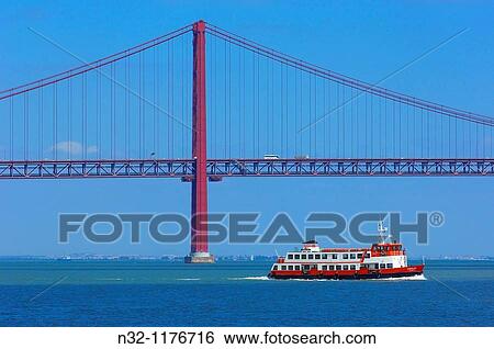 Lisbon, 25th abril bridge, Tagus river Tejo River, Portugal. View Large Photo Image Stock Photograph - Lisbon, 25th abril bridge, Tagus river Tejo River, Portugal.. Fotosearch