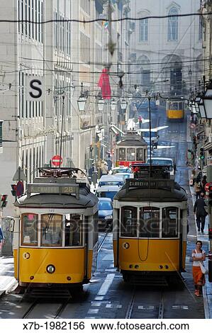 Lisbon. Portugal. Trams on the streets of Baixa. View Large Photo Image Stock Photograph - Lisbon. Portugal. Trams on the streets of Baixa.. Fotosearch
