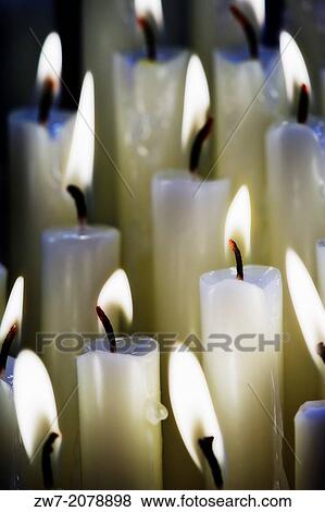 Lit candles. View Large Photo Image Stock Photo - Lit candles.. Fotosearch
