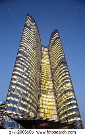 Lit futuristic skyscrapers downtown Abu Dhabi, United Arab Emirates View Large Photo Image Stock Photography - Lit futuristic skyscrapers downtown Abu Dhabi, United Arab Emirates. Fotosearch