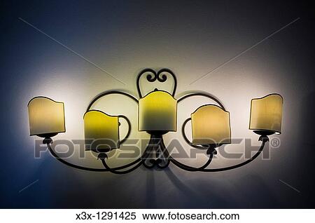 Lit wall lamp in the dark View Large Photo Image Stock Photography - Lit wall lamp in the dark. Fotosearch