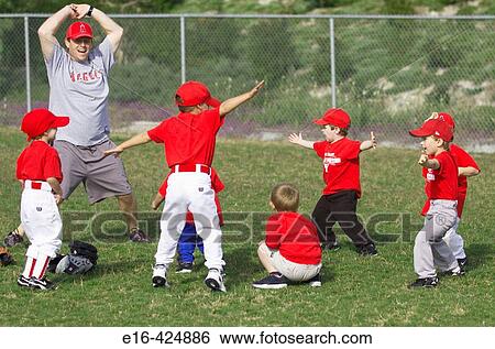 Stock Photograph - Little baseball players warming up. Fotosearch