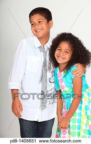 Little boy and girl and happy smailing View Large Photo Image Stock Image - Little boy and girl and happy smailing. Fotosearch