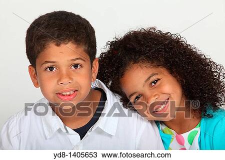 Little boy and girl and happy smailing View Large Photo Image Stock Image - Little boy and girl and happy smailing. Fotosearch