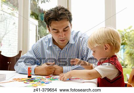 Little boy doing handicraft View Large Photo Image Picture - Little boy doing handicraft. Fotosearch