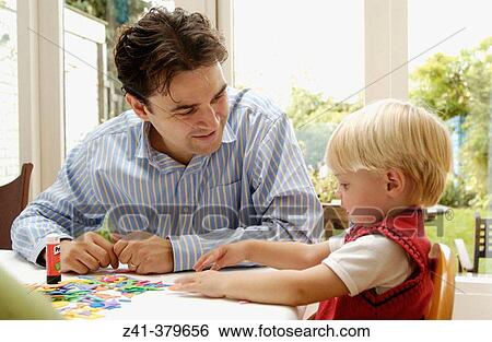 Little boy doing handicraft View Large Photo Image Stock Photograph - Little boy doing handicraft. Fotosearch