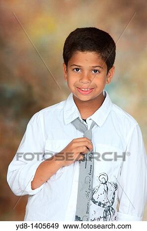 Little Boy posing smailing looking at the camera View Large Photo Image Stock Photo - Little Boy posing smailing looking at the camera. Fotosearch