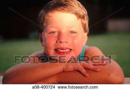 Little boy proudly shows off his toothless smile. USA. View Large Photo Image Picture - Little boy proudly shows off his toothless smile. USA.. Fotosearch